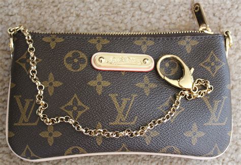 louis vuitton wristlet fake for sale